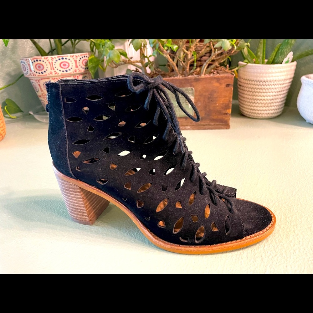 Black peep toed high heel booties. size 7.5